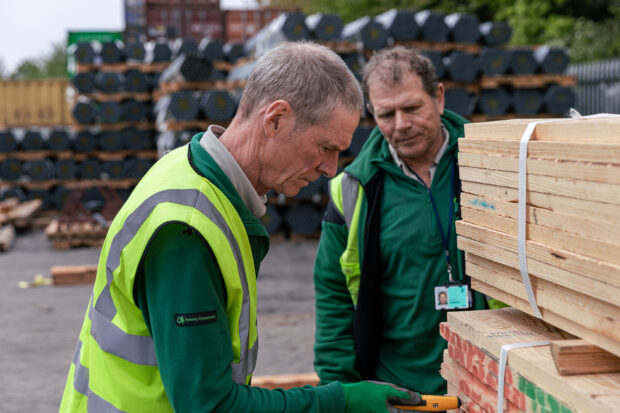 inspectors checking pallets at border control